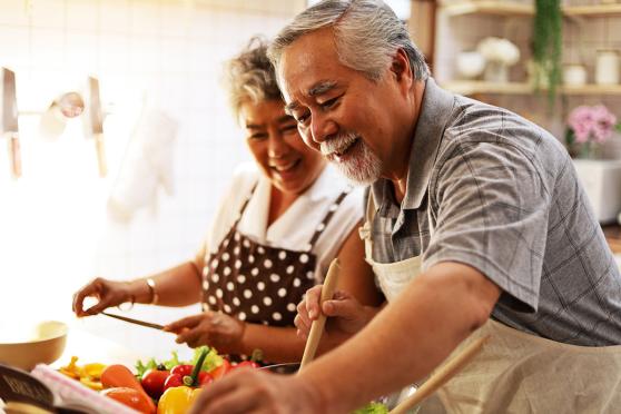 Senior couple cooking together